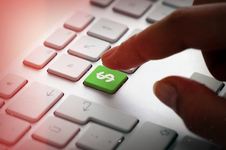 На ноутбуке среди белых кнопок есть одна зеленая из символом доллара